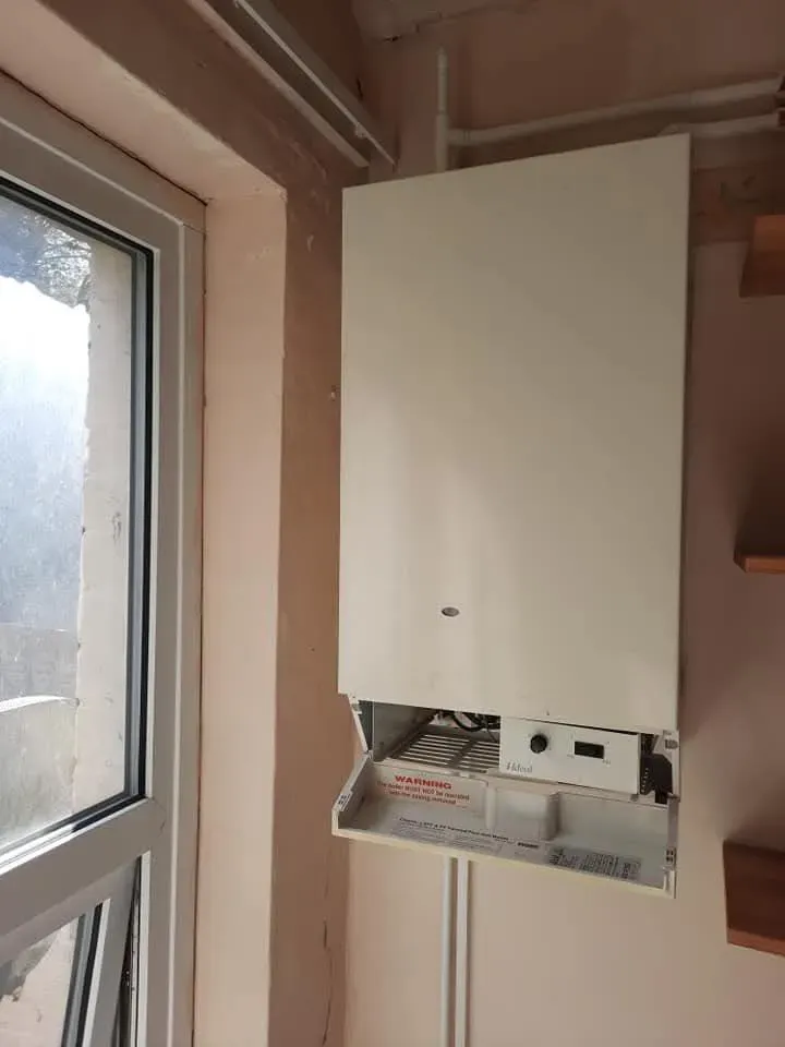 Local boiler repair team fixing a unit in Faringdon