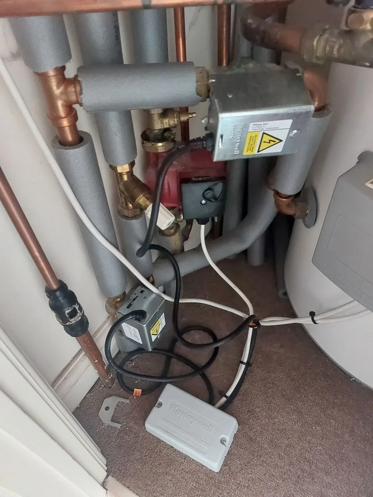 Qualified engineer performing gas safety check in Swindon