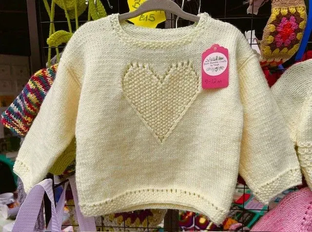 8219064534344-djchphhuz7j5lt6yftdzb-Yellow-heart-jumper thumbnail image