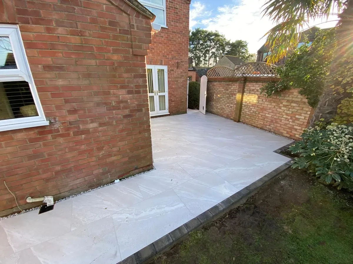 Before and after transformation of lawn in Attleborough
