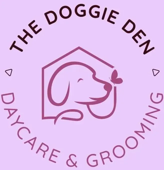 The Doggie Den Daycare & Grooming logo