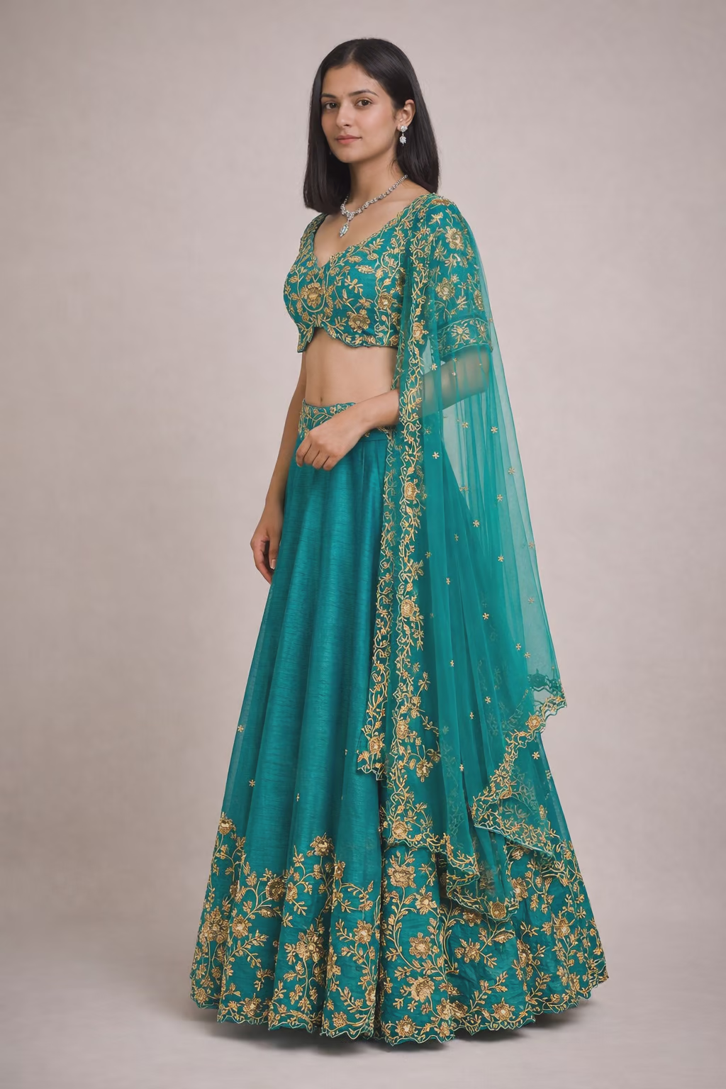 Turquoise Silk Blend Lehenga Choli with Gold Embroidery