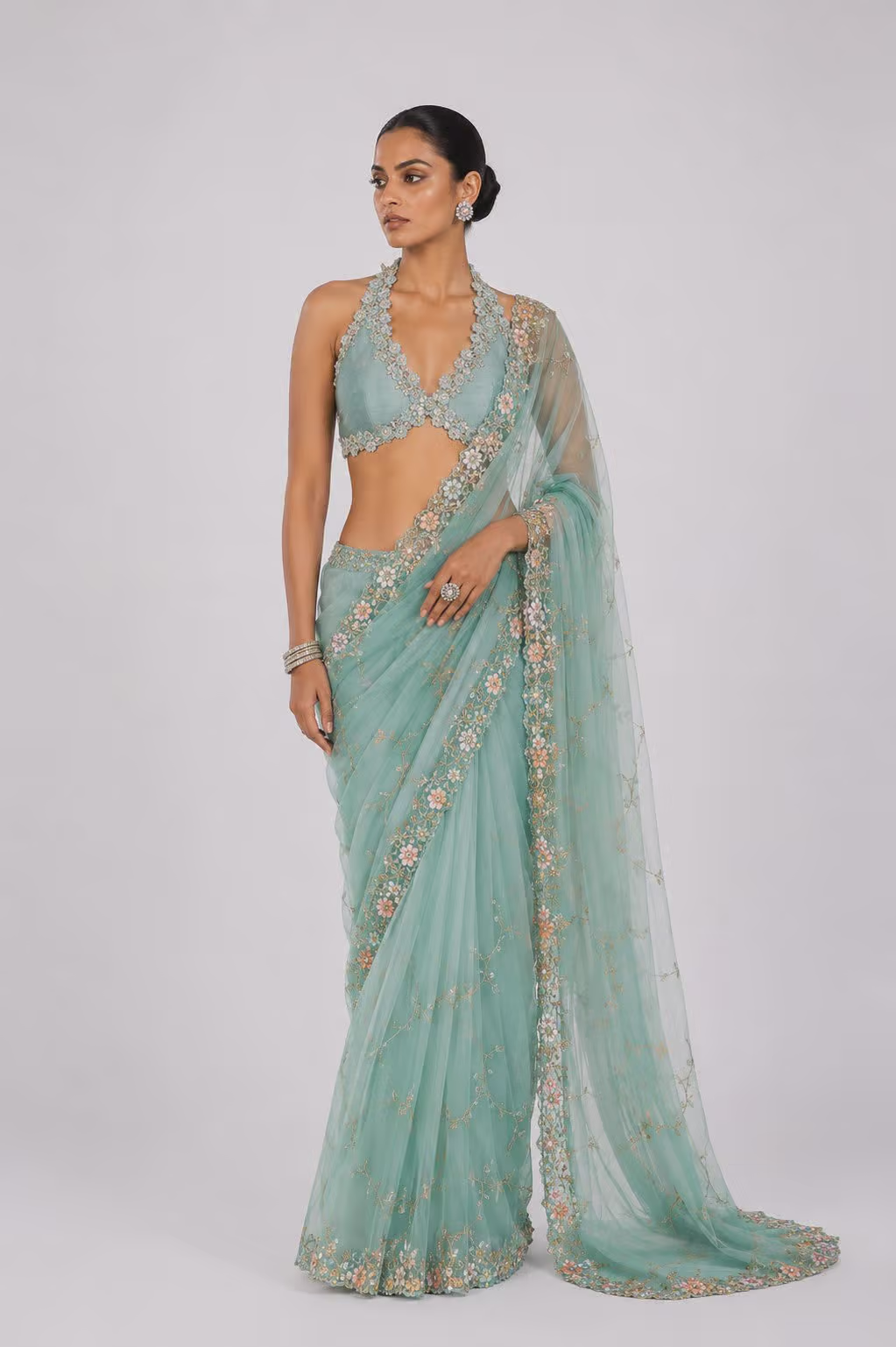 Pastel Green Net Saree with Floral Embroidery