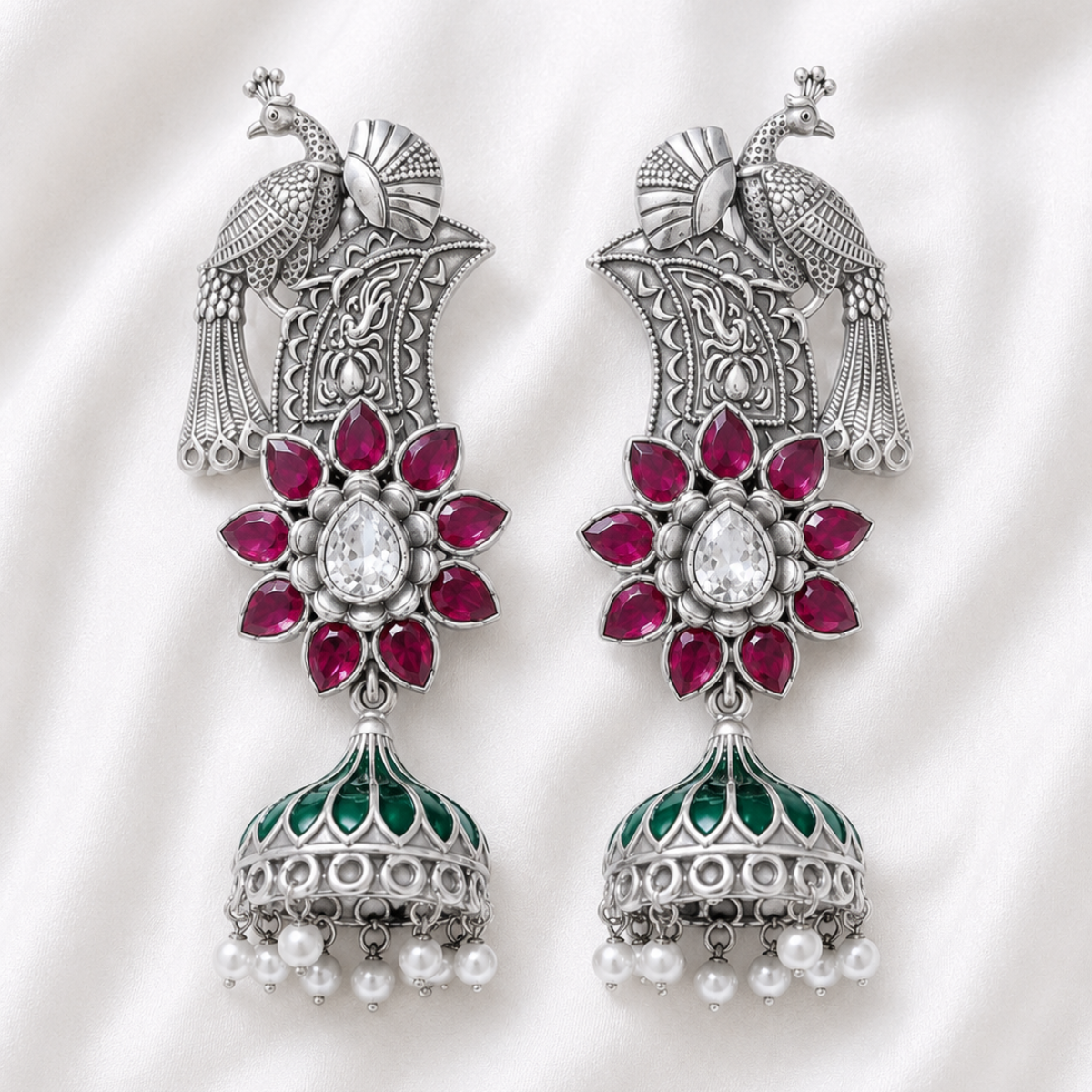 Peacock Motif Silver Jhumka Earrings with Colored Stonework