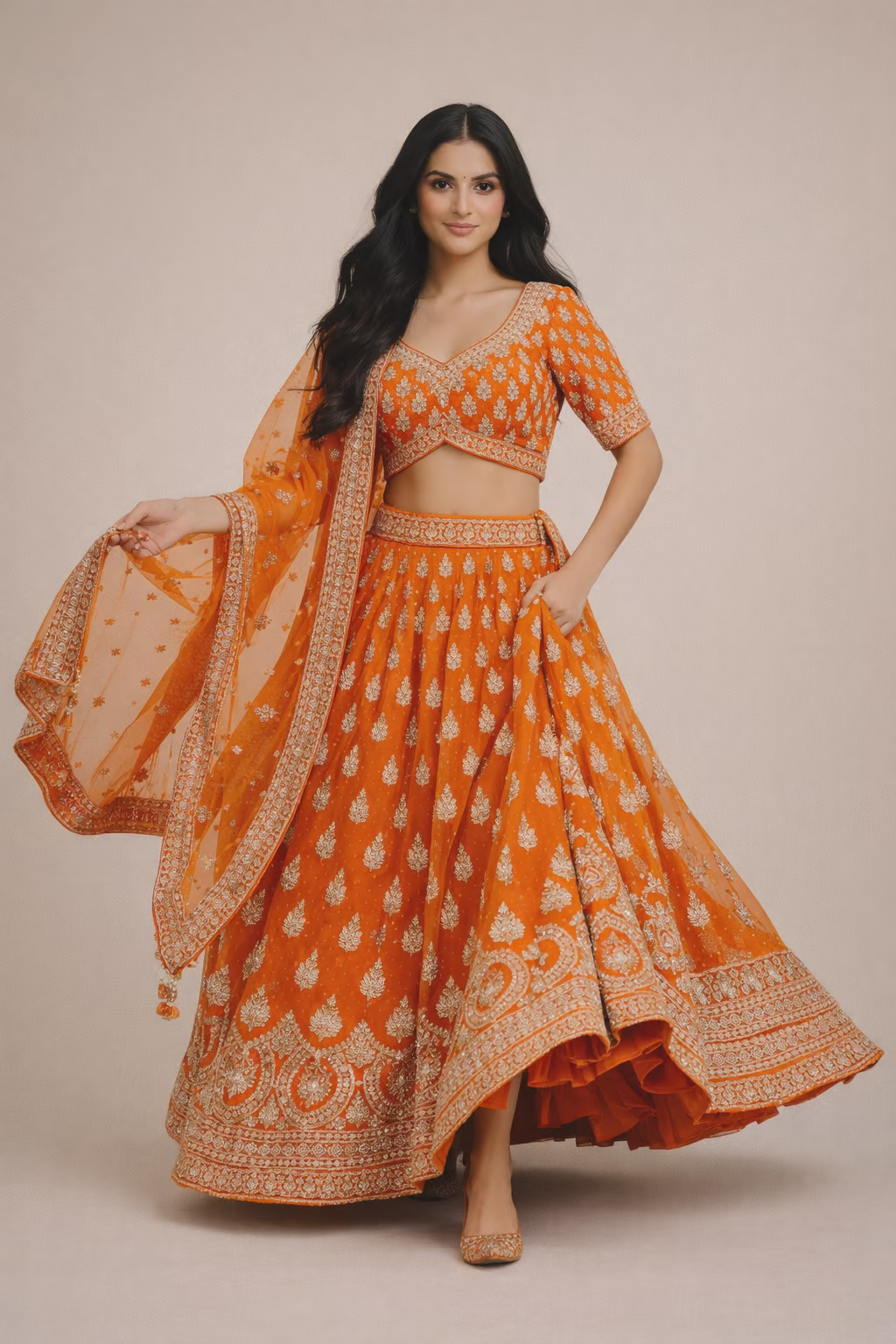 Heavy Embroidered Orange Silk Net Lehenga Choli