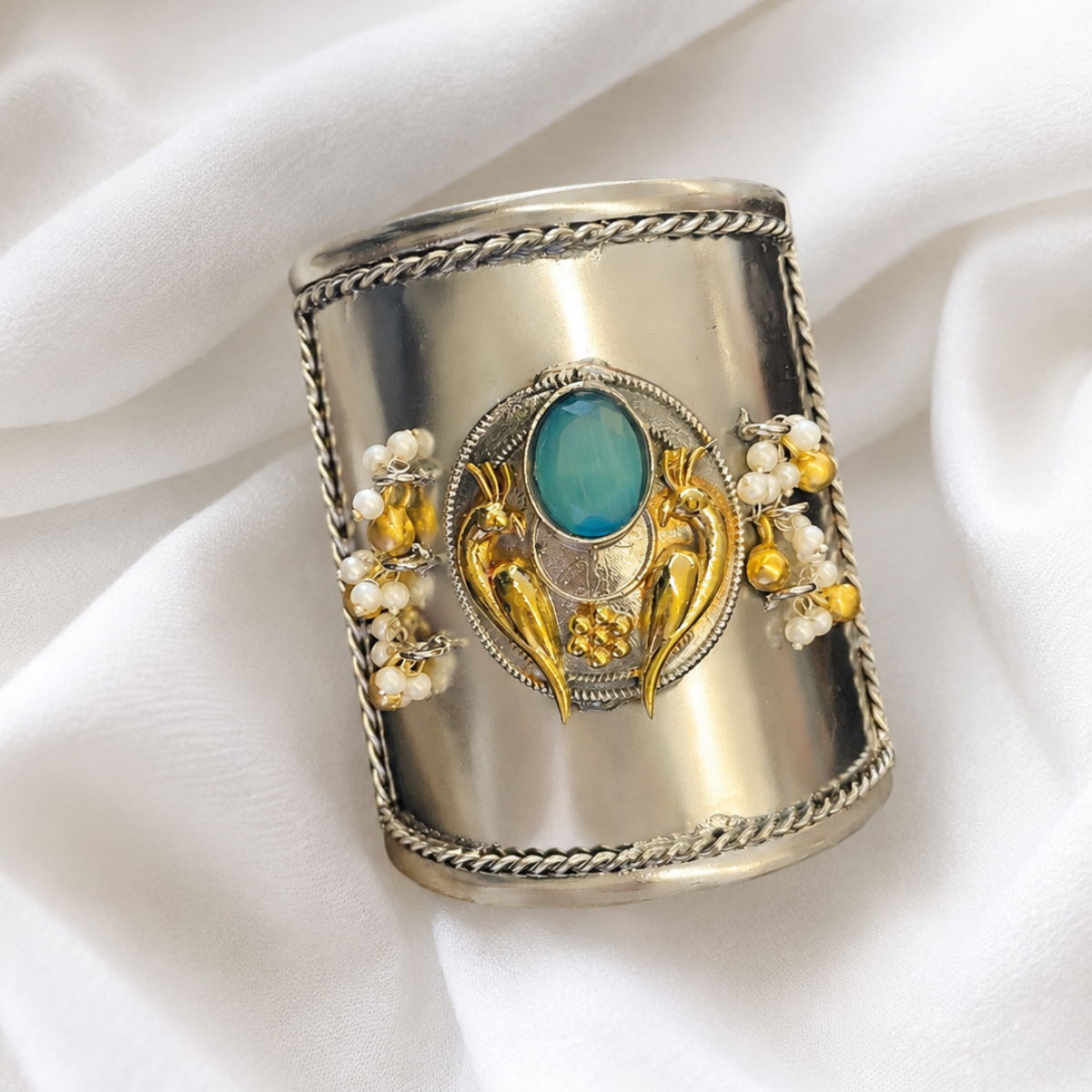 Silver Cuff Bracelet with Gold Bird Motif and Stone Center