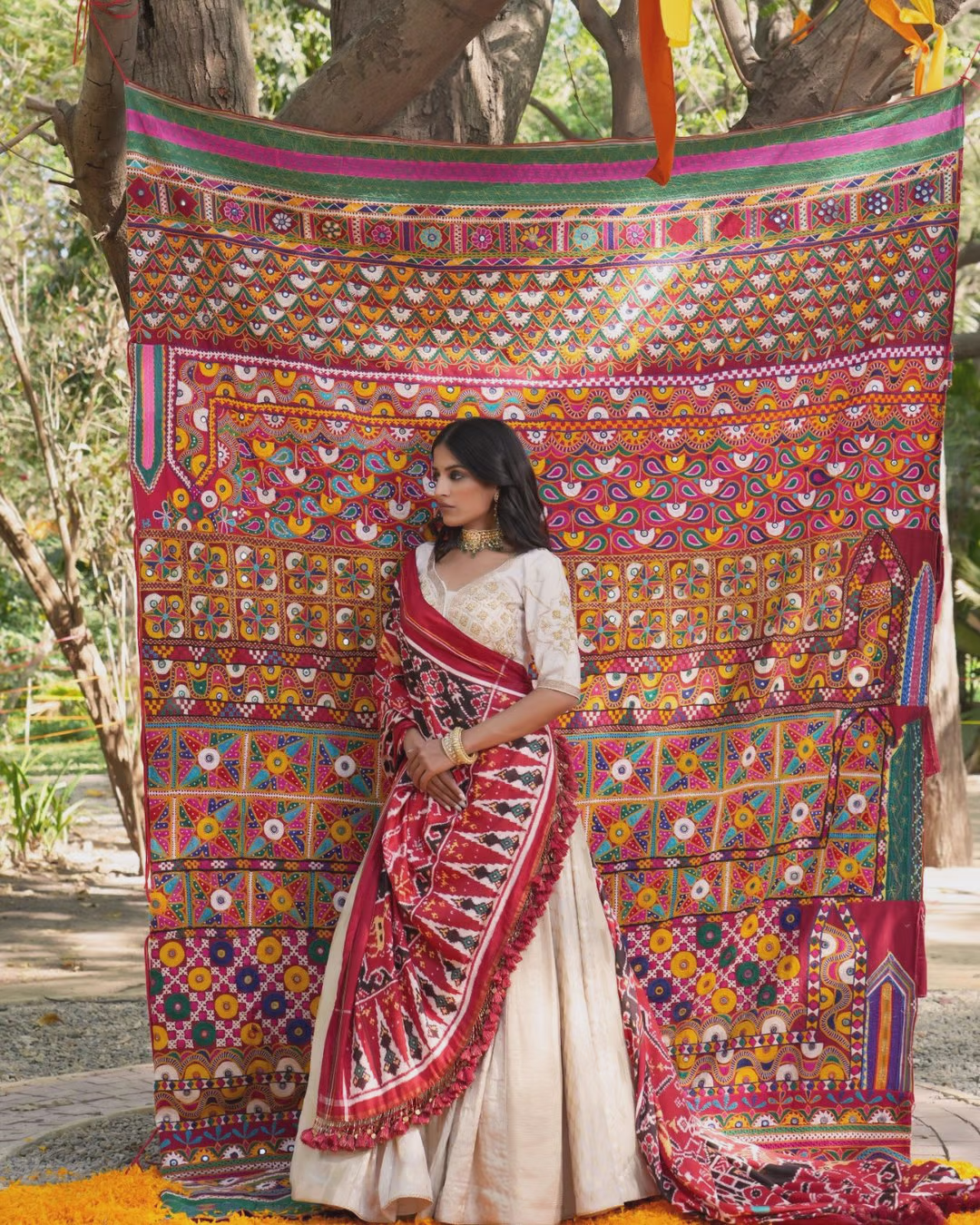 Ivory Lehenga with Red Bandhani Dupatta and Embroidered Blouse