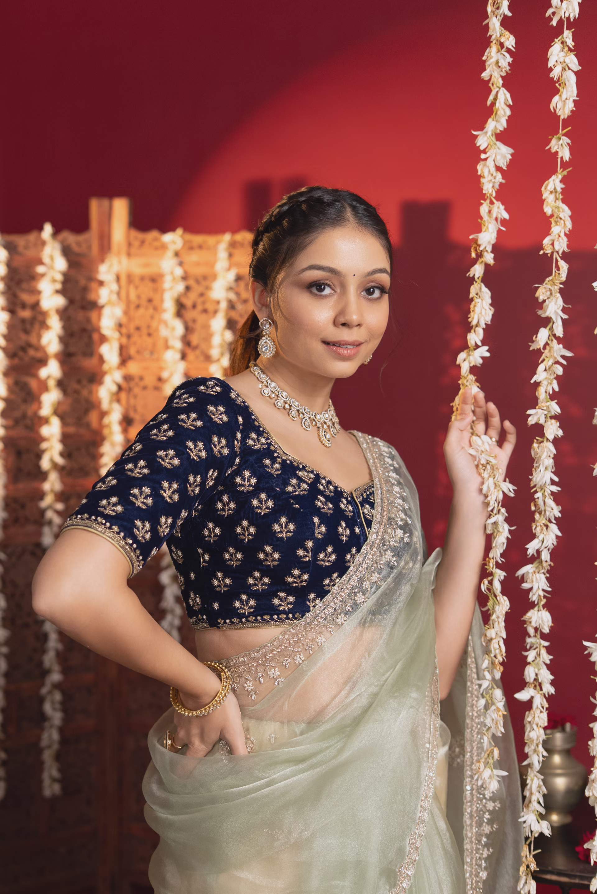 Mint Green Net Saree with Navy Blue Embroidered Blouse
