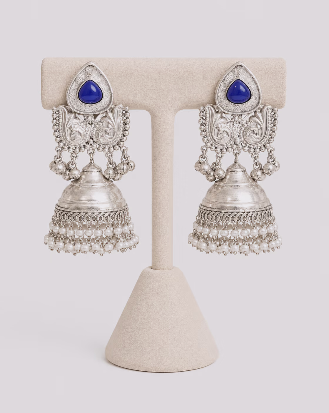 Silver Jhumka Earrings with Blue Stone and Pearl Detailing