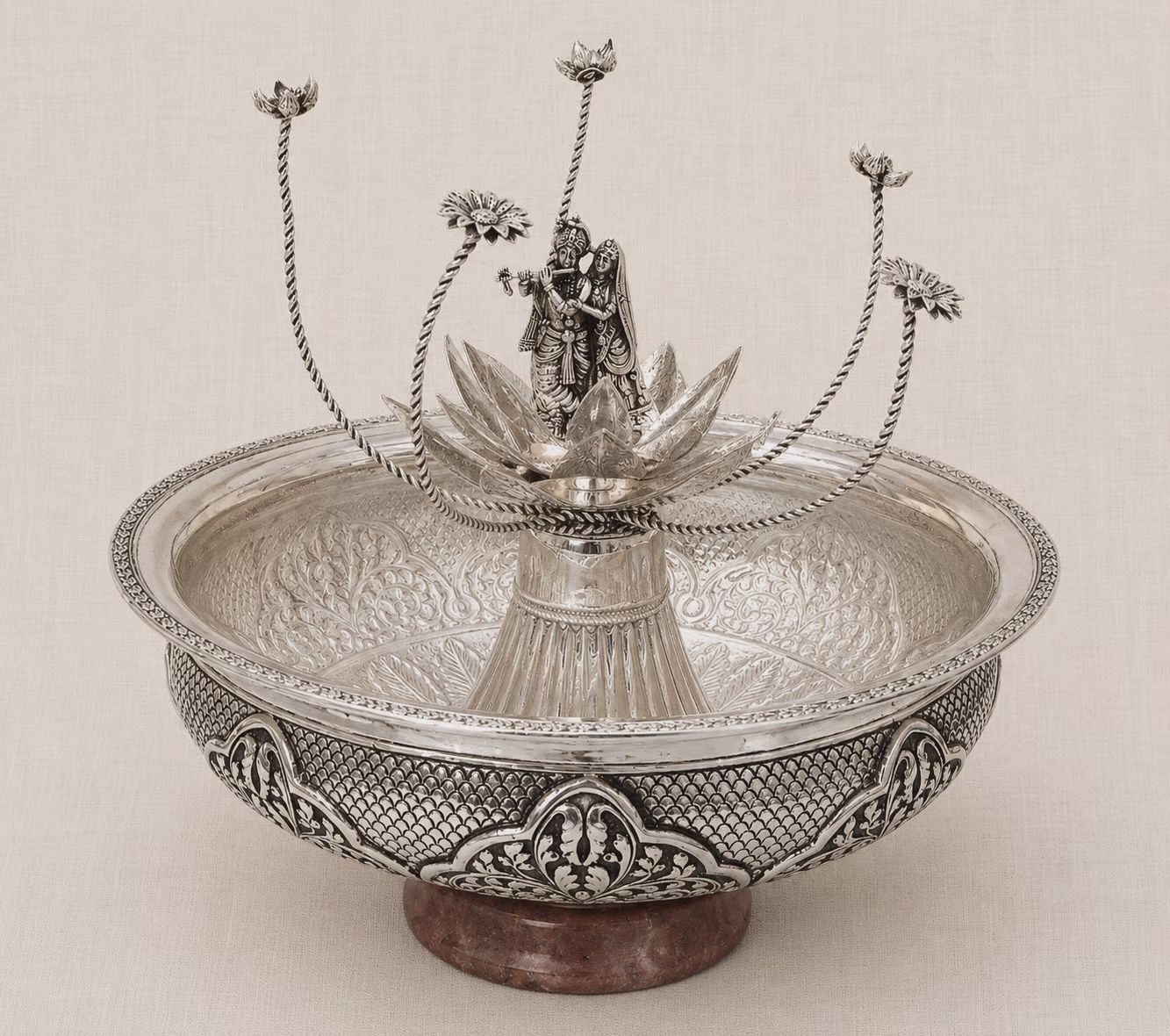 Silver Decorative Bowl with Radha Krishna Figurine and Floral Stems