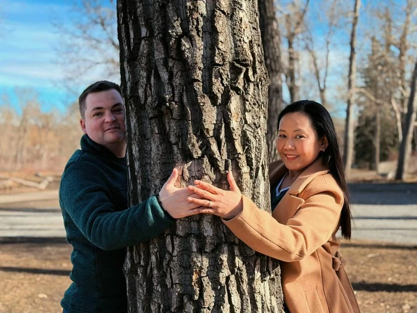 Couple sitting by the river