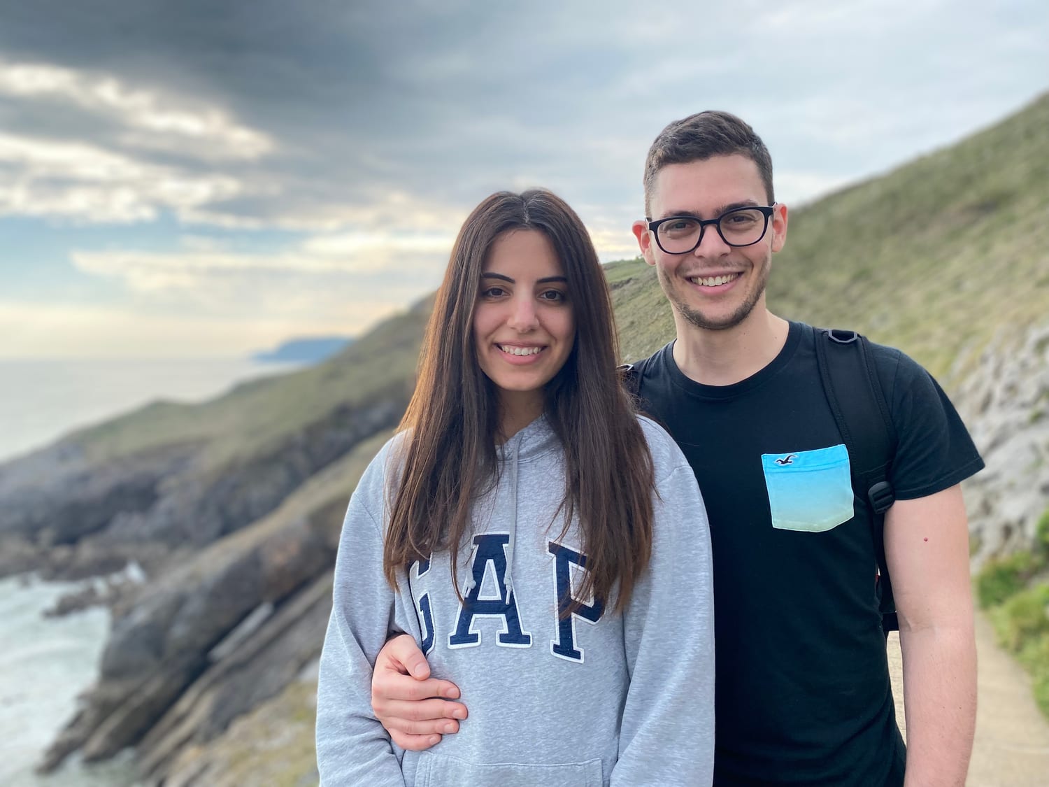 Neofytos and Tatiana on the coastal cliffs, smiling together