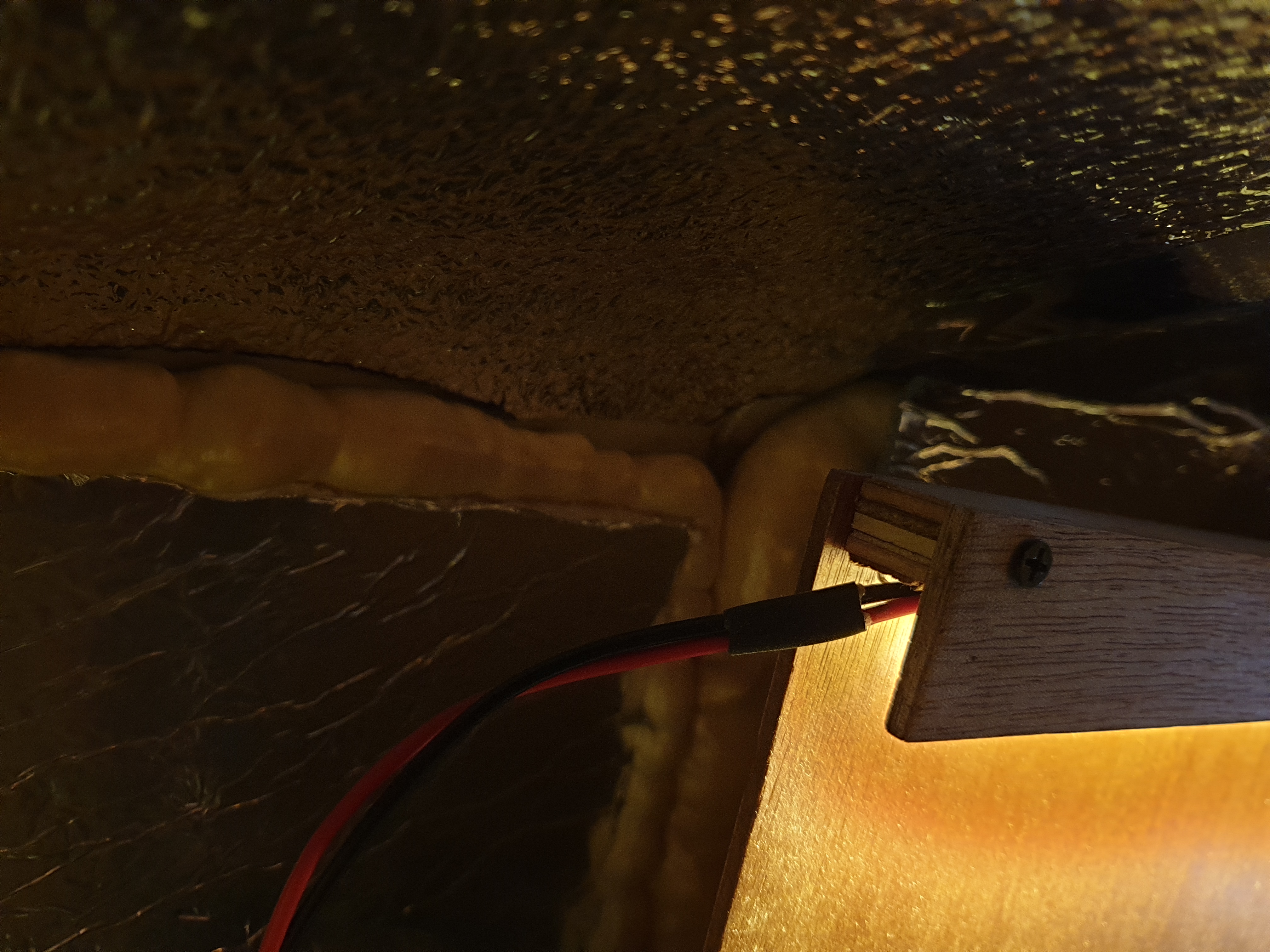 The van wall from the end, showing insulation