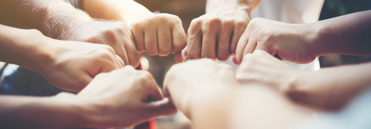 people joining hands