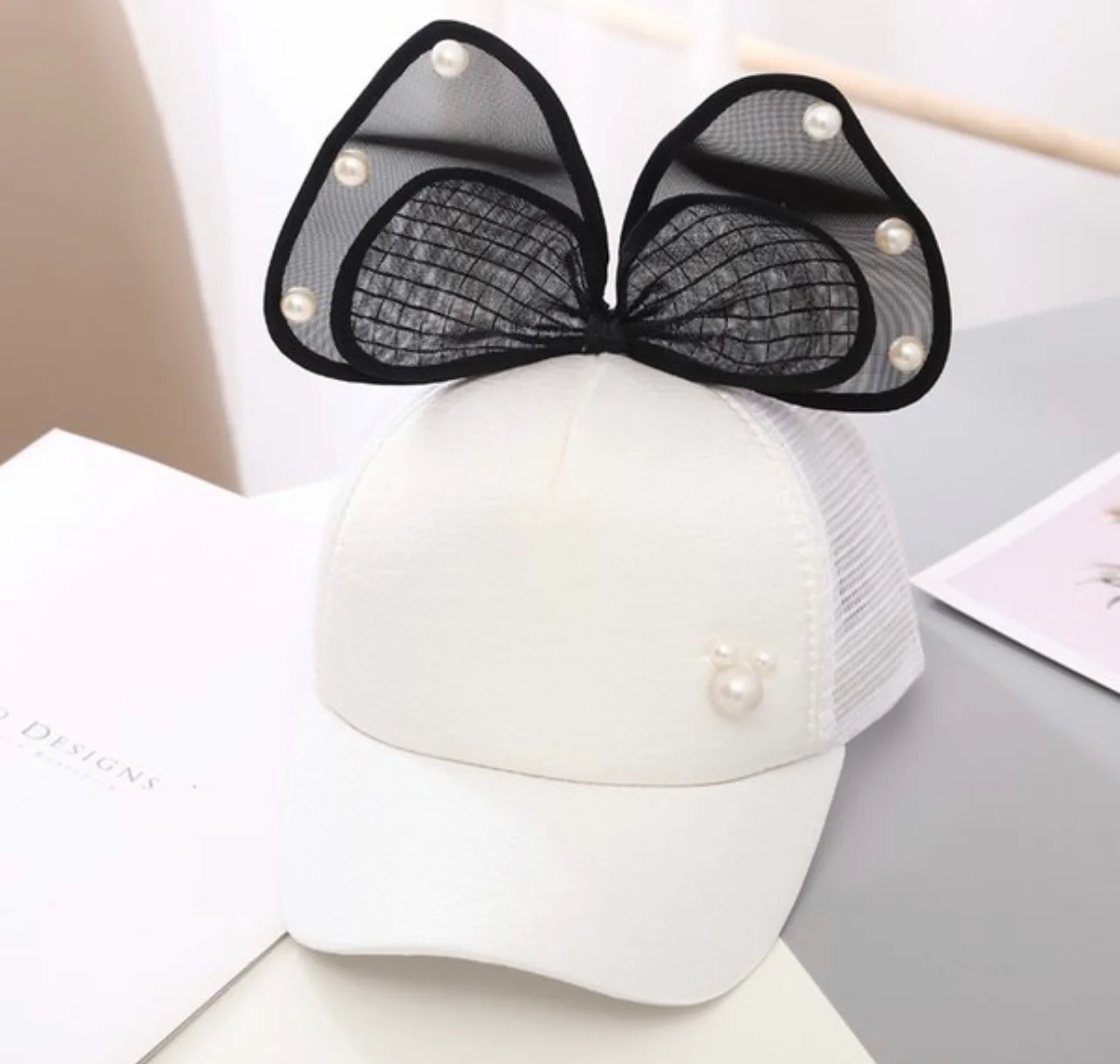 GORRA CON LAZO NACARADO