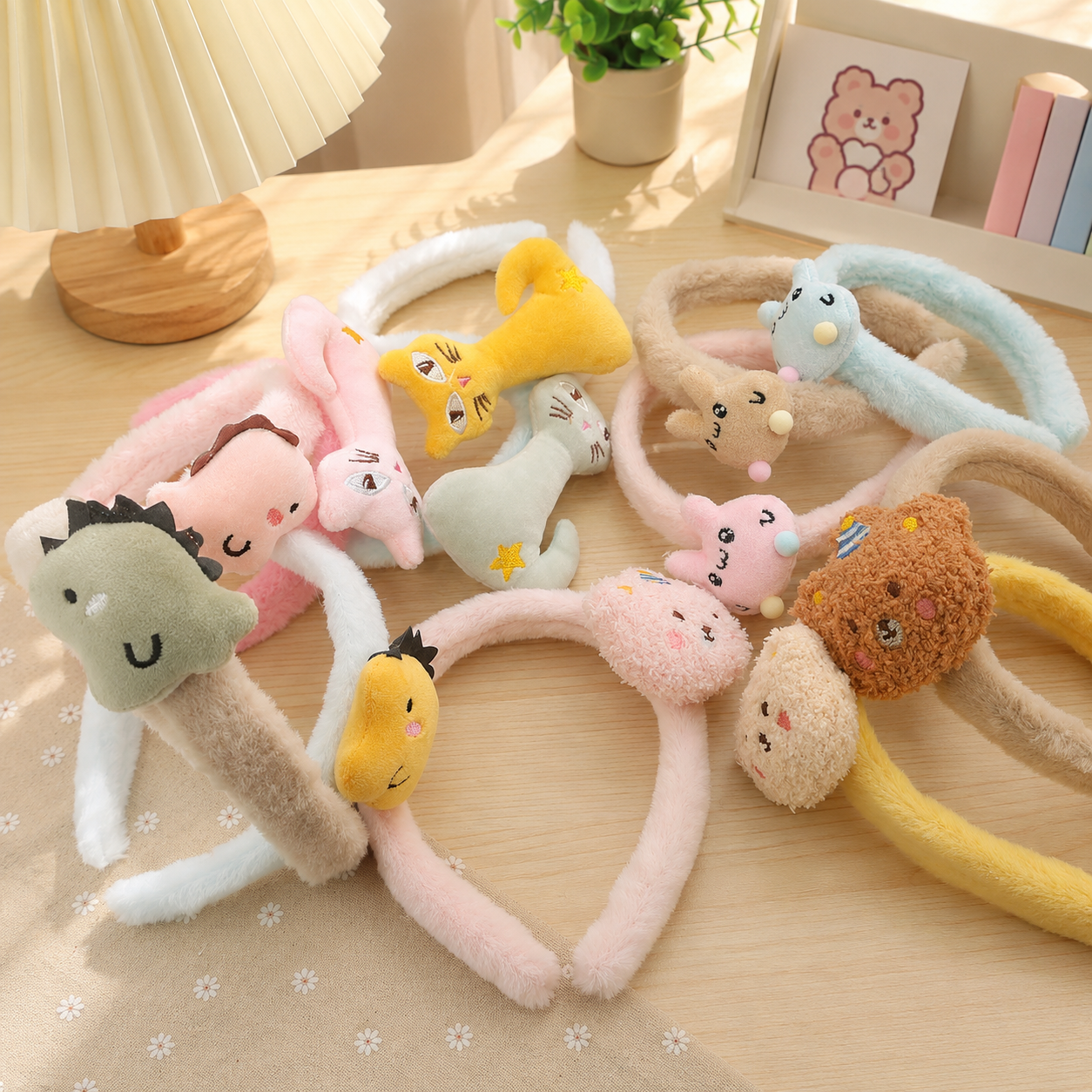  DIADEMA SURTIDAS DE PELUCHE