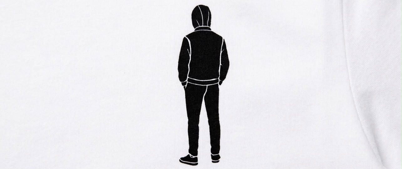 White oversized T-shirt with a black logo on the upper left side 3
