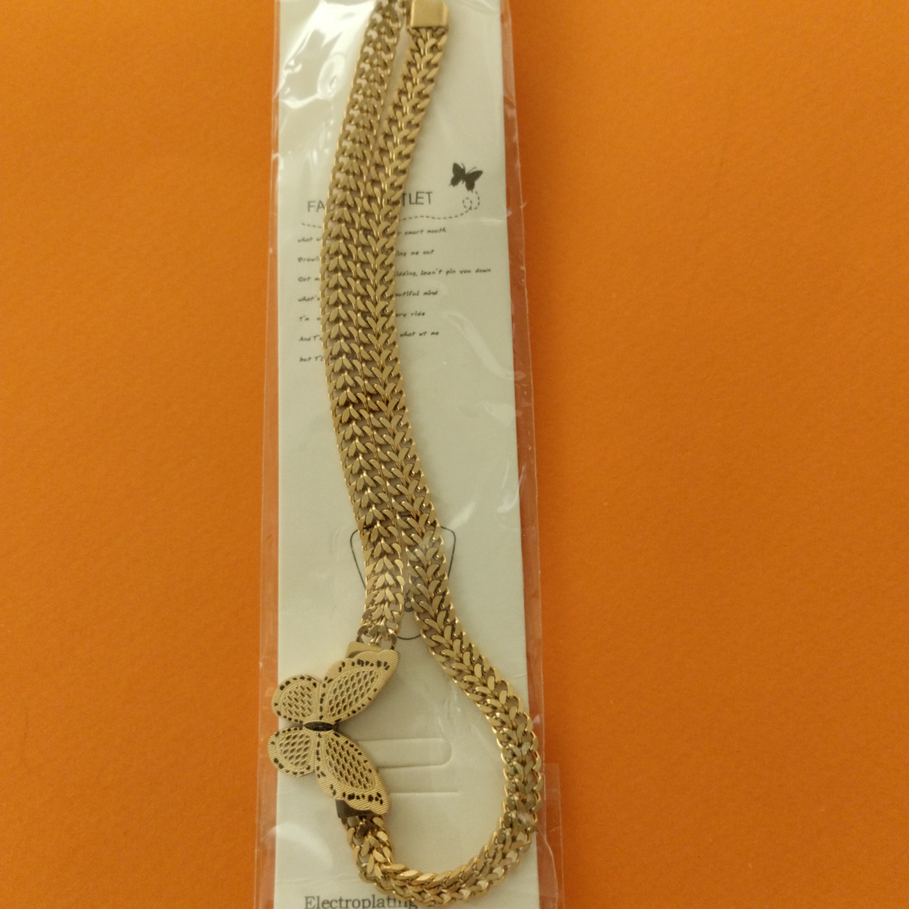 Collier papillon doré 