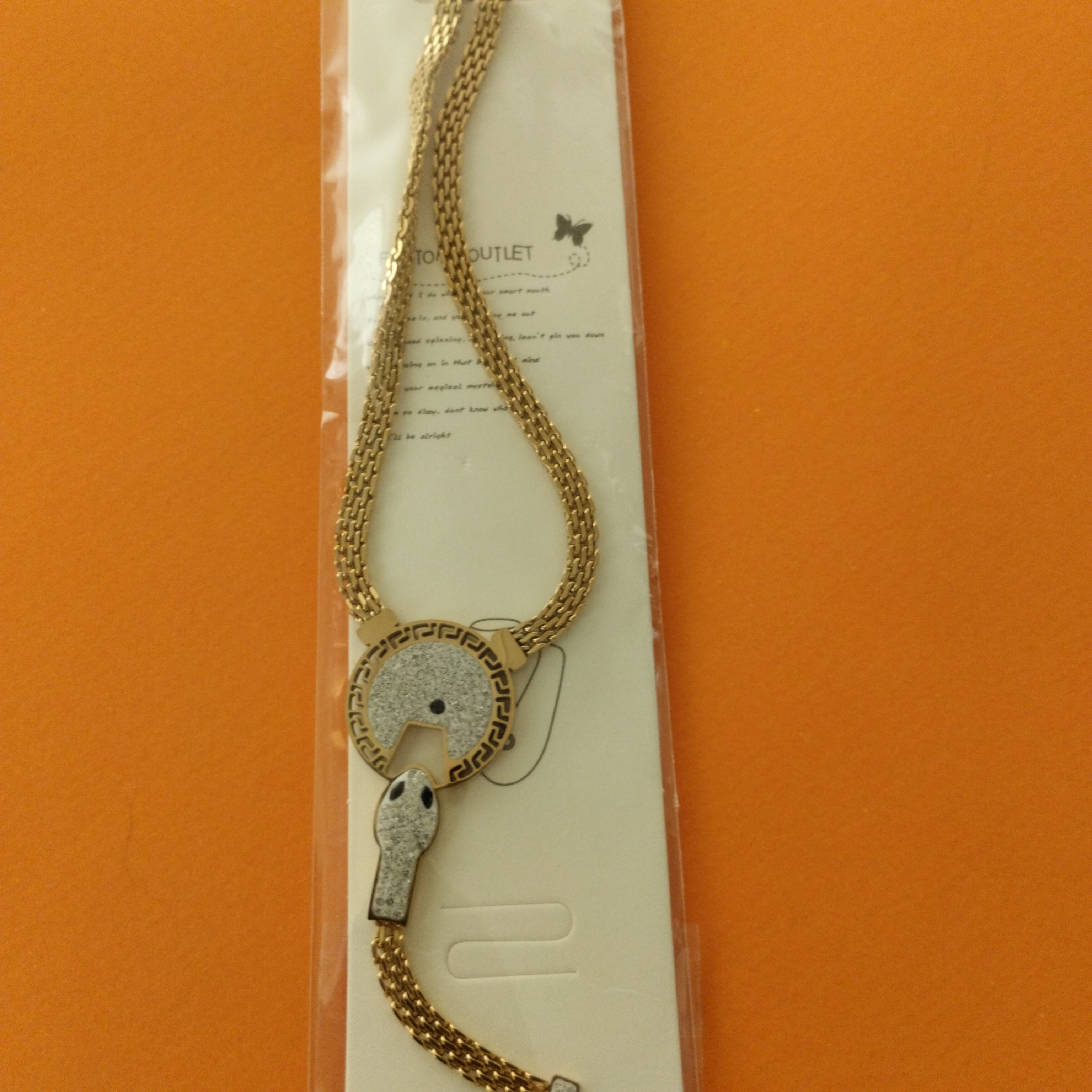 Collier serpent doré