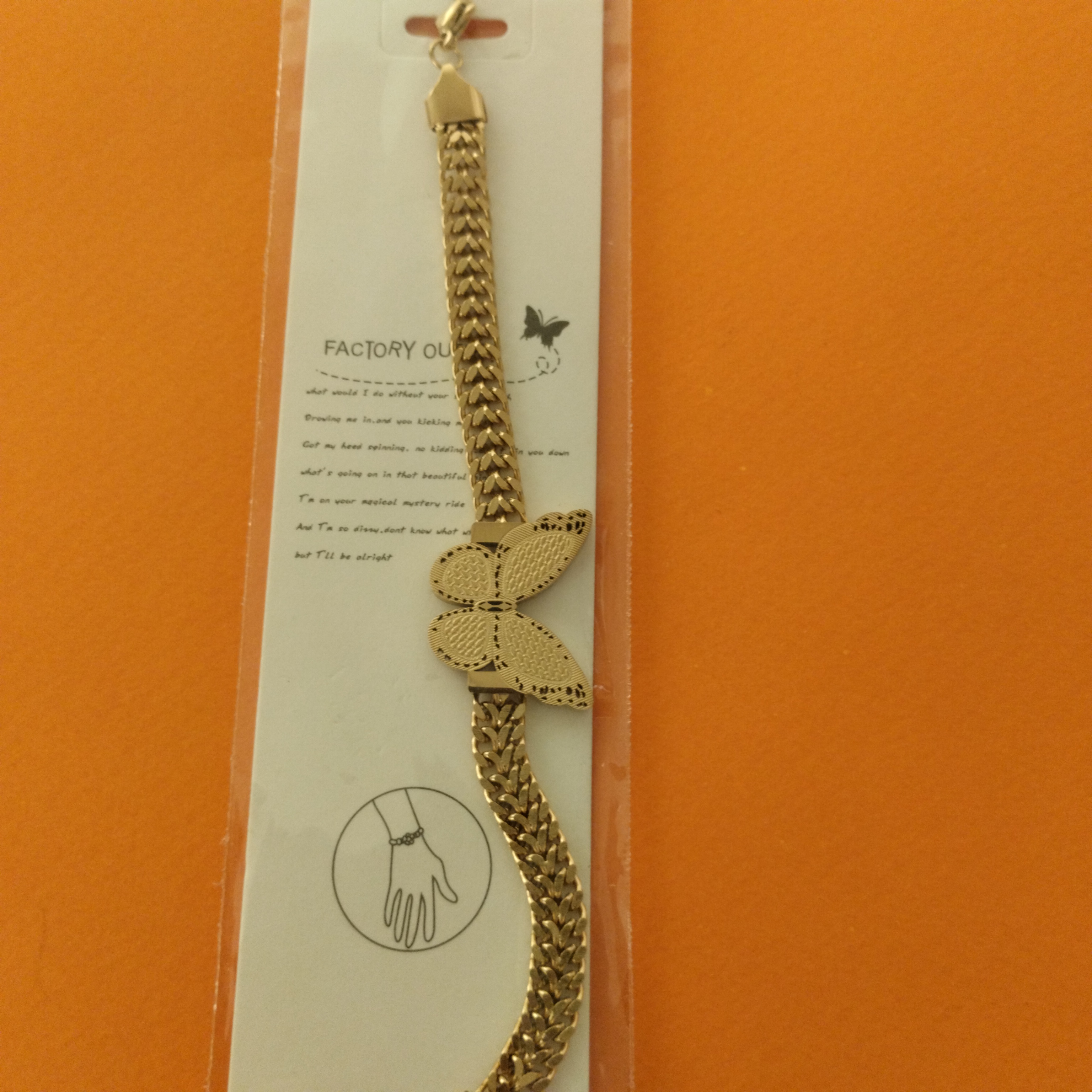 Bracelet papillon doré 