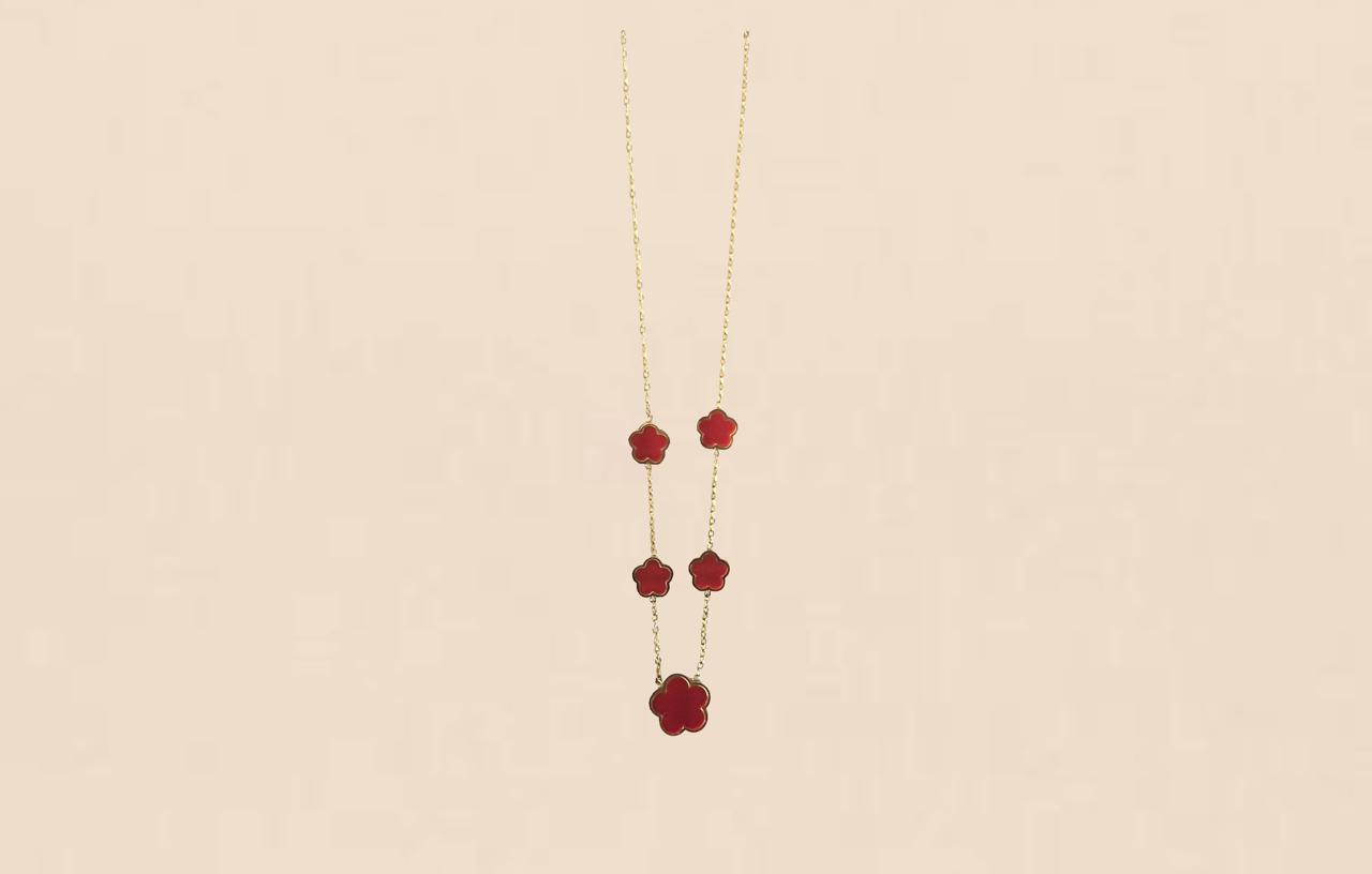 Collier doré trèfle rouge