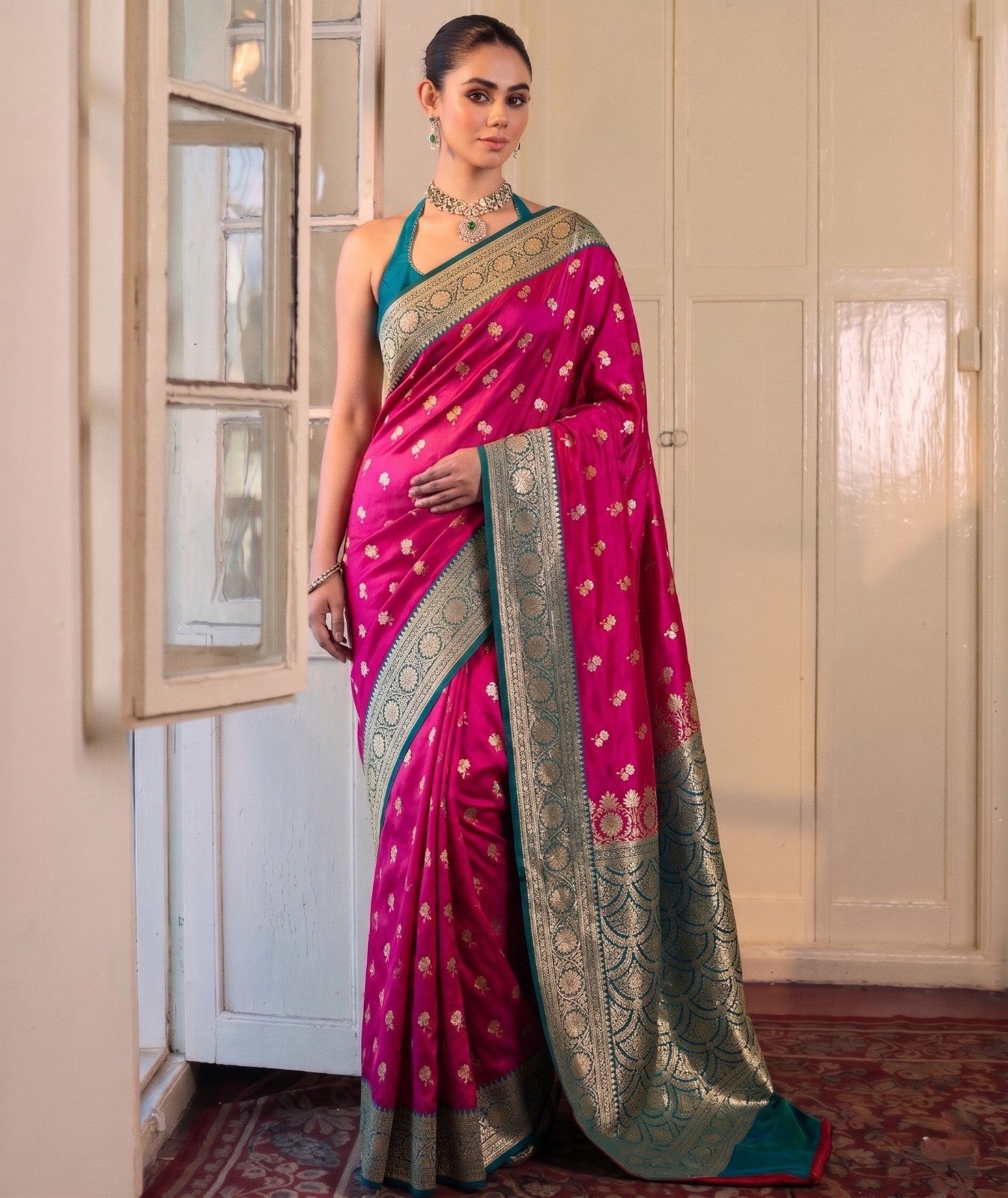 Rani Pink Banarasi Katan Silk Saree with Peacock Teal & Gold Zari Border