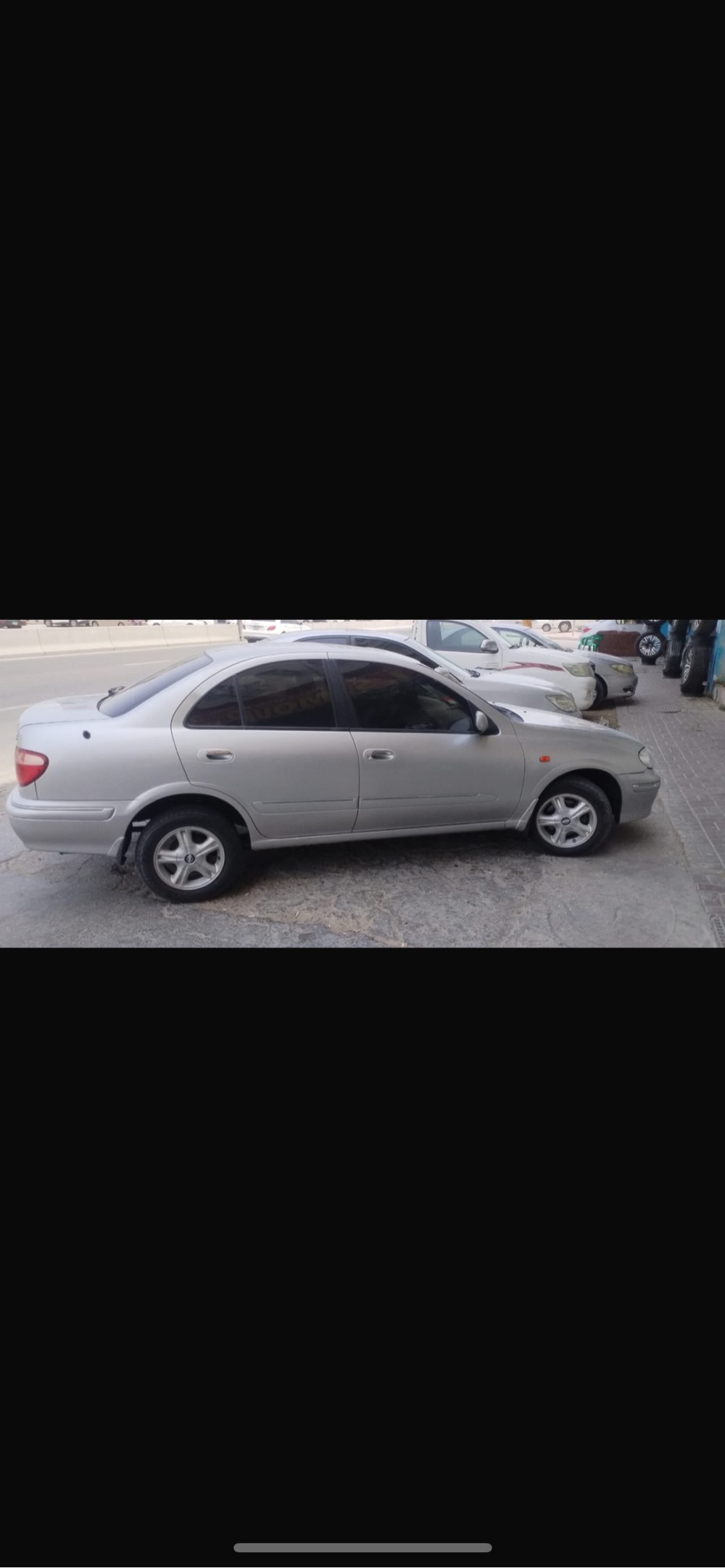 Nissan Sunny 2002 photo 2
