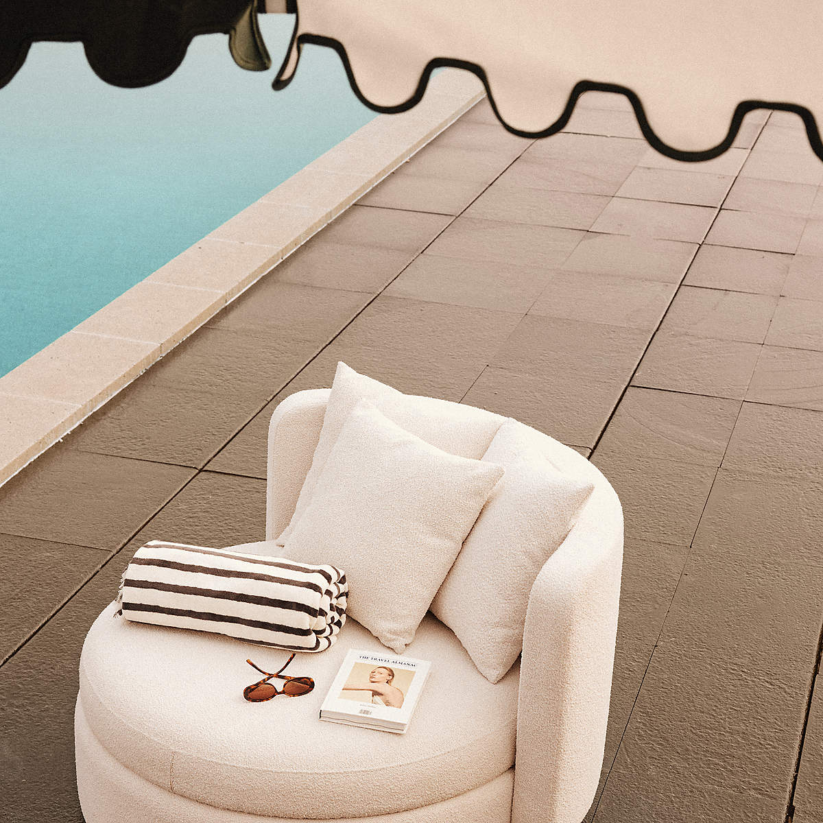 Lucie Outdoor Swivel Chair by Goncalo Campos