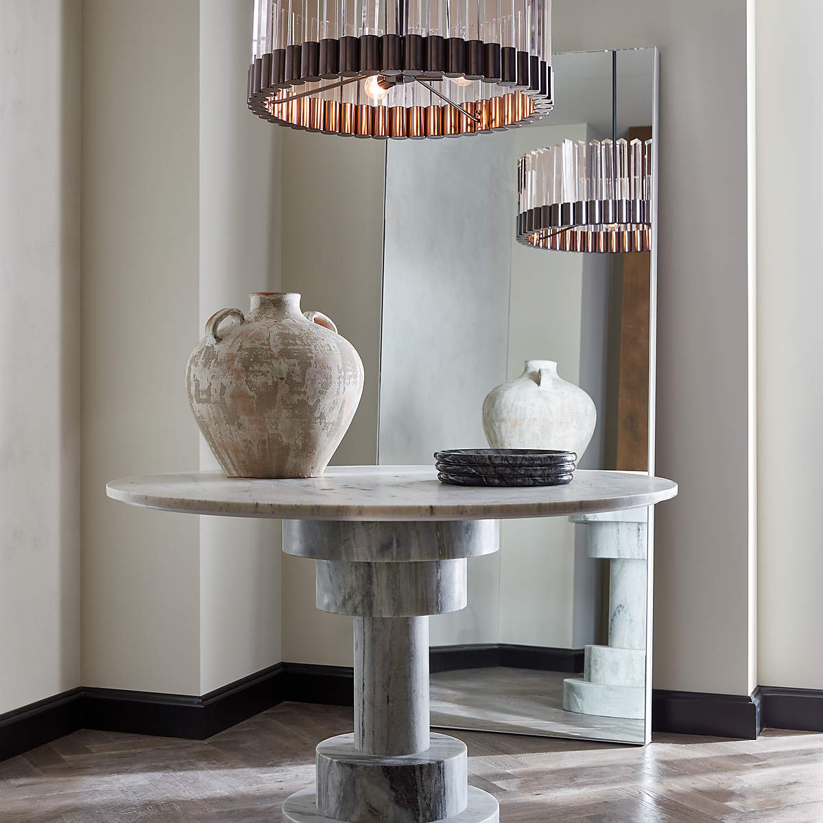 Kota Tiered Pedestal Dining Table by Mermelada Estudio