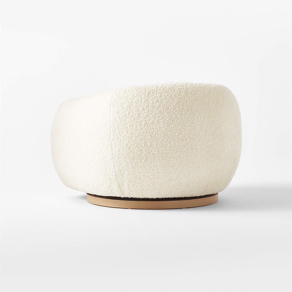 Laszlo Swivel Chair by Ross Cassidy