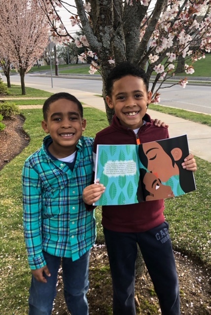 2 boys under flowering tree