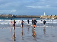 Local swimmers entering Orient beach