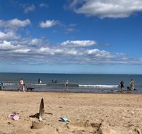 Beautiful beach for swimming. Very calm this morning. Lots of other people swimming and paddle boarding
