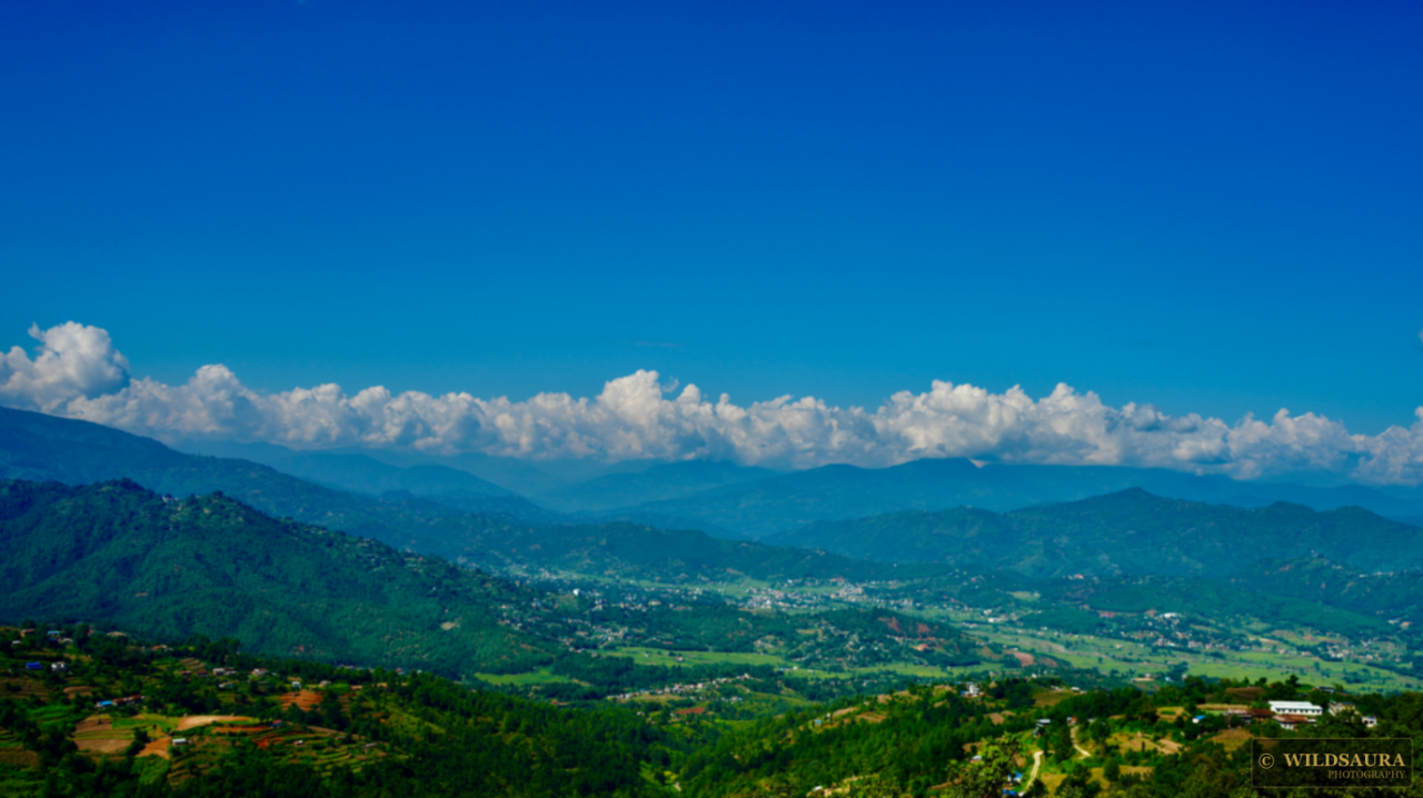 Green Valley, Distant Clouds