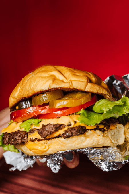 Burger con queso + Papas + Refresco