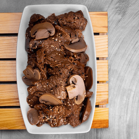 LOMITO CHAMPIÑONES DE SALSA DE OSTRAS