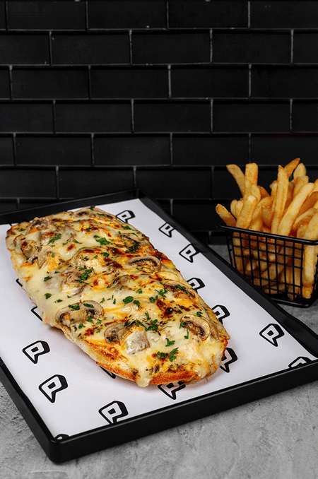 PEPITO CHAMPIÑON GRATINADO