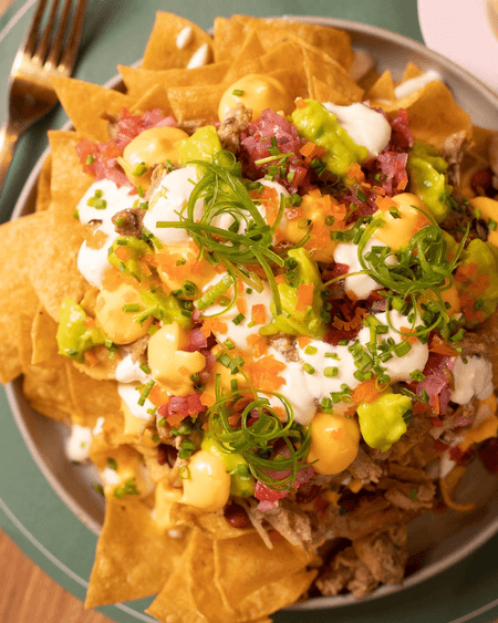 NACHOS DE CARNITAS DE CERDO 