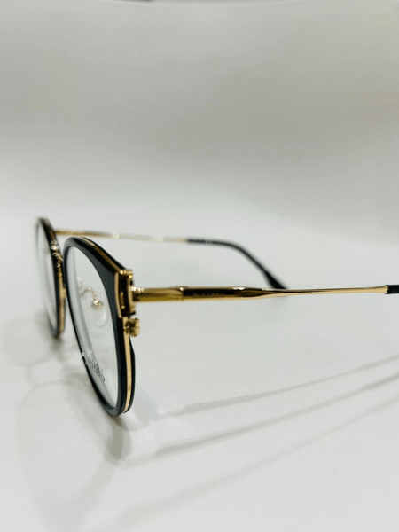 Dama. PALAZZO. Negra con varillas en metal. 