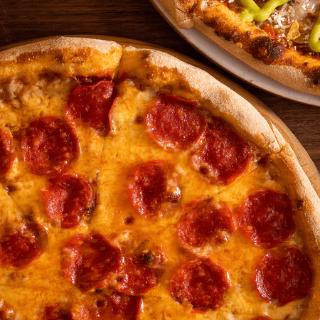 Mitad Pepperoni + Elige tu otra mitad