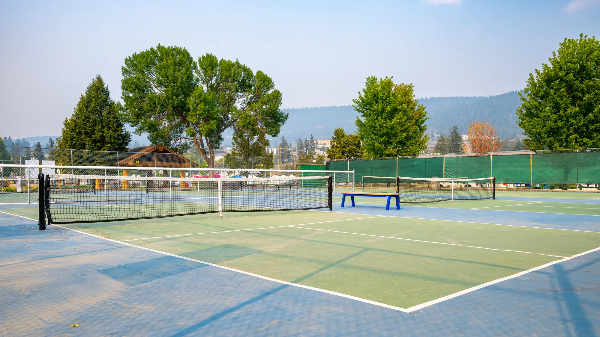 Wishbone Aylesbury Backless Bench at the Kiwanis Pickleball Cour