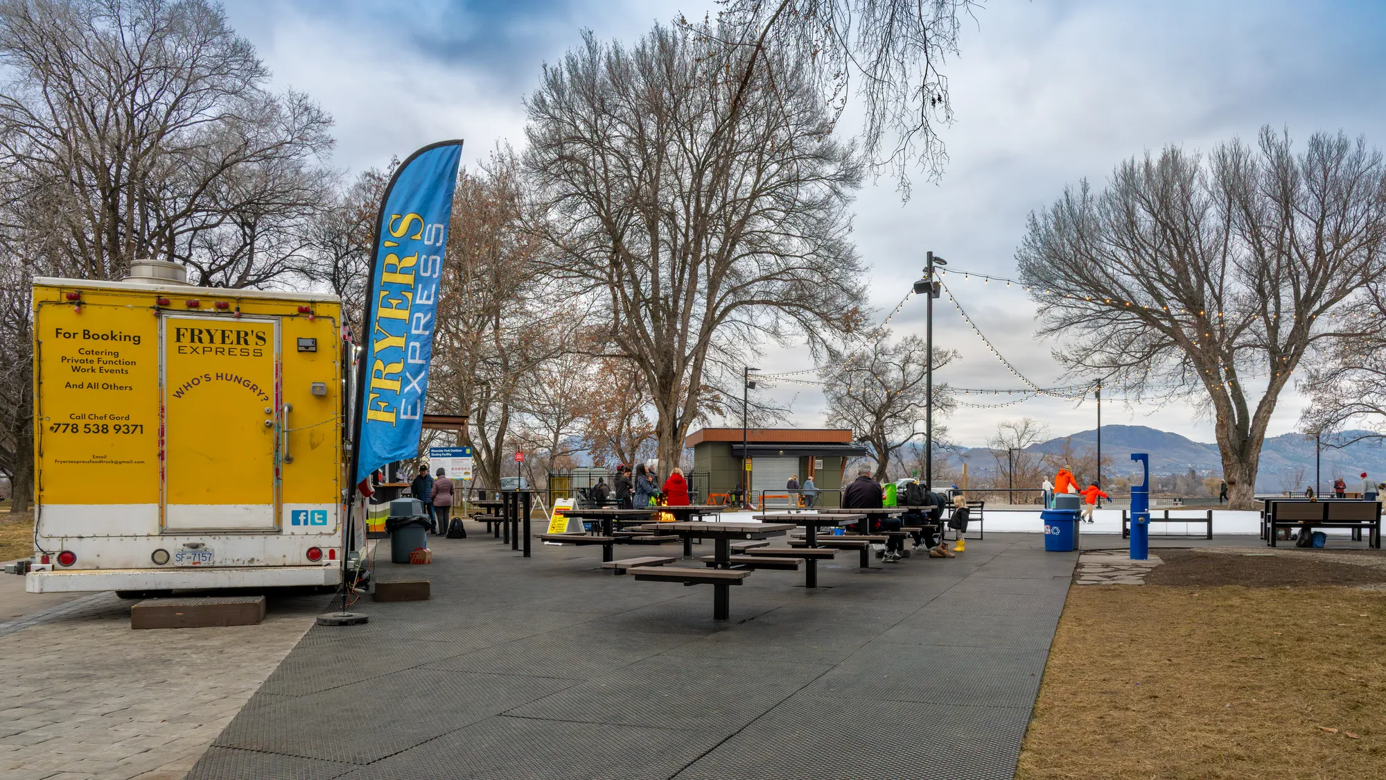 Wishbone Single Pedestal Picnic Tables at Riverside Skating Loop