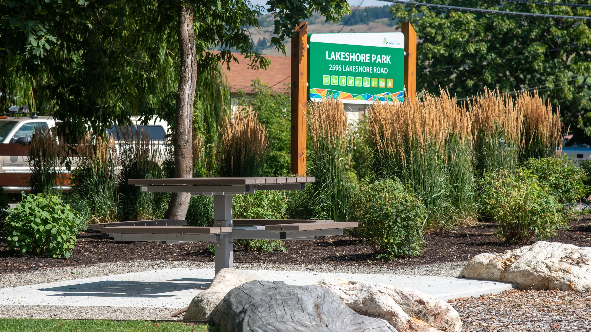 Wishbone Single Pedistal Picnic Table at Lakeshore Park in Verno