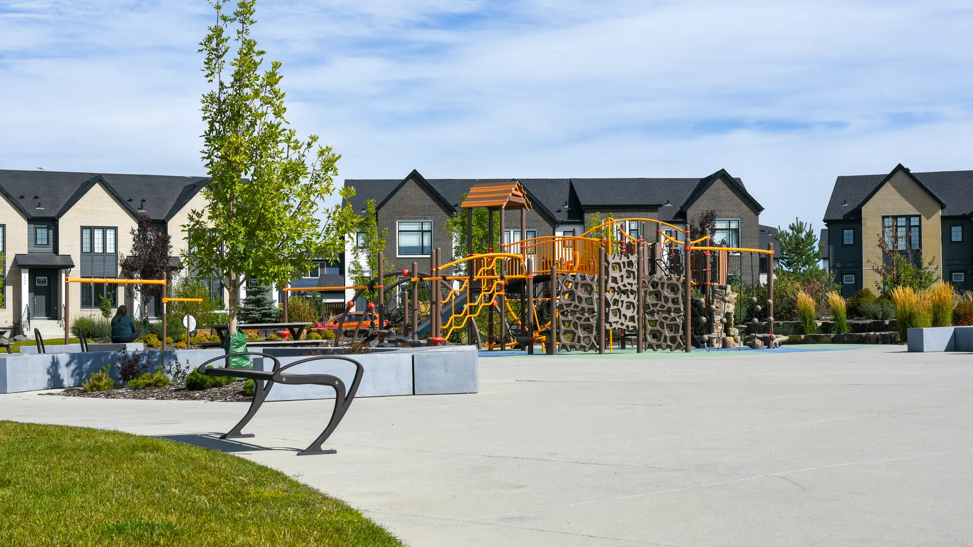 Wishbone TENAJ Backless Bench at Harmony Community Near Calgary,