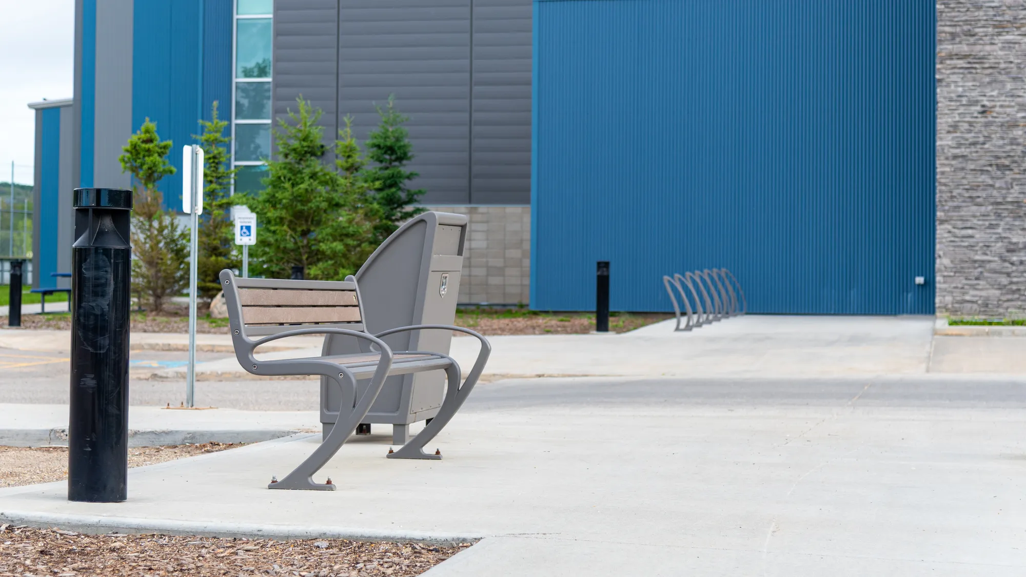 Wishbone TENAJ Benches , Waste Receptacle and Bike Racks in Peac