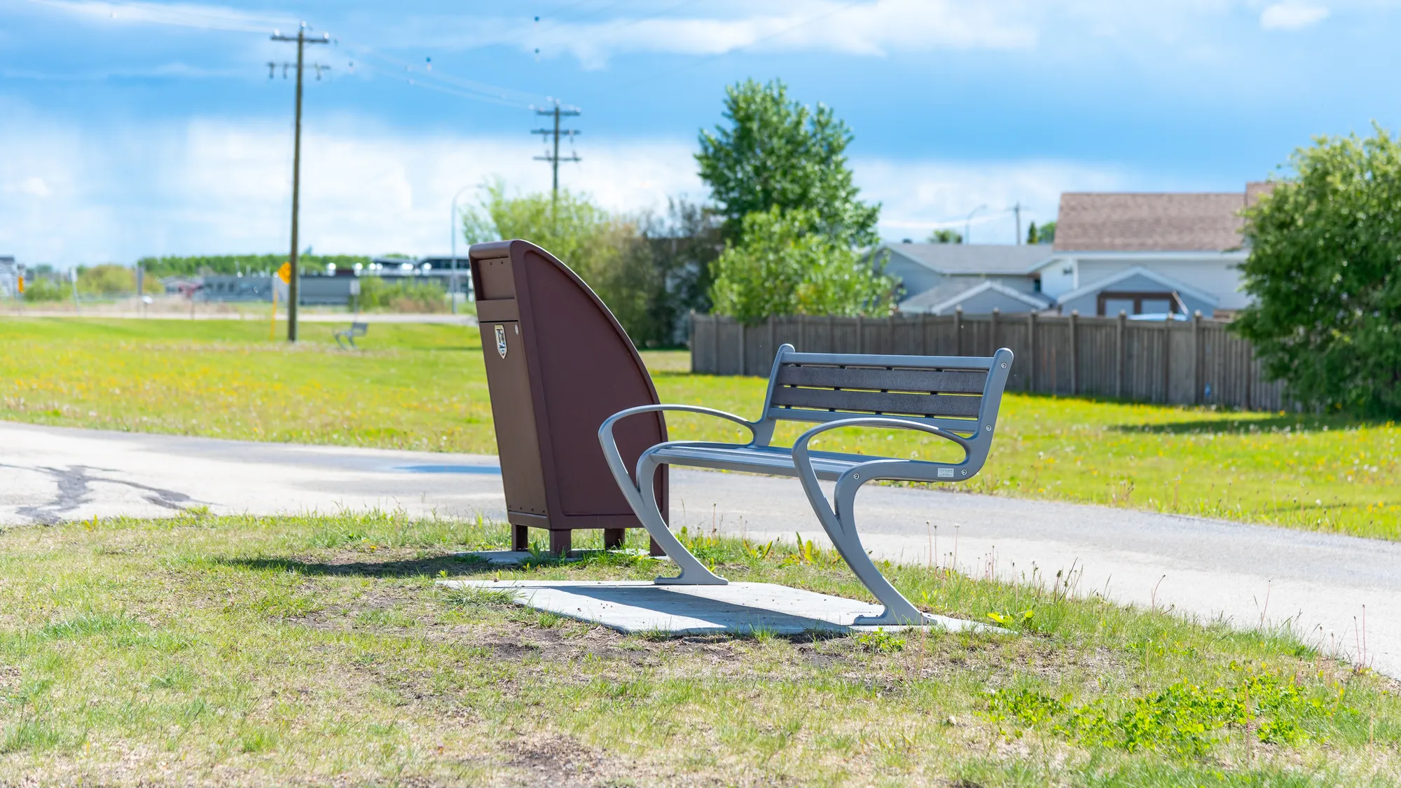 Wishbone TENAJ Bench and TENAJ Waste Receptacle in Clairmont Alb