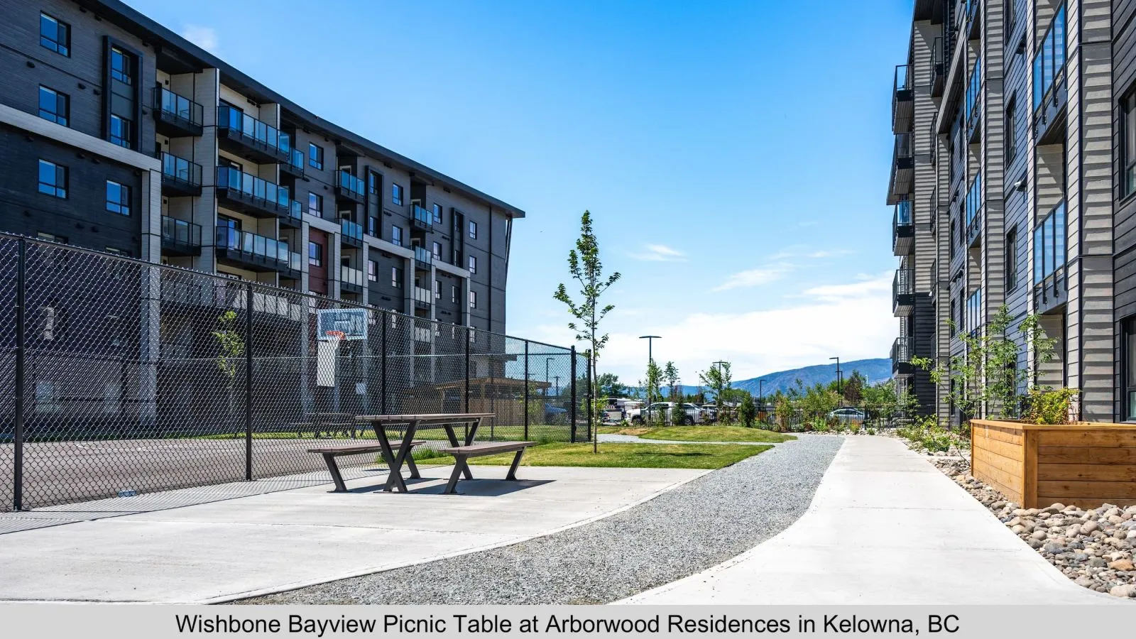 Bayview picnic table provides a place to gather at Arborwood Residences. This outdoor table features recycled plastic lumber and a sturdy metal frame.