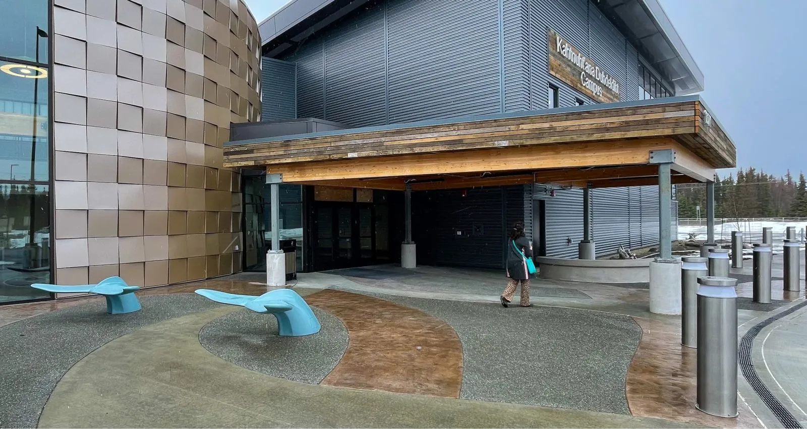 Whale Tail benches provide whimsical seating outside the Kenaitze Education Center on the Kenai Peninsula. These benches add a playful touch to the campus landscape.