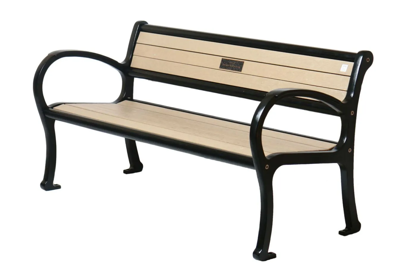 The Mountain Classic bench features recycled plastic lumber slats and a durable powder-coated metal frame. This bench offers comfortable seating for outdoor spaces.