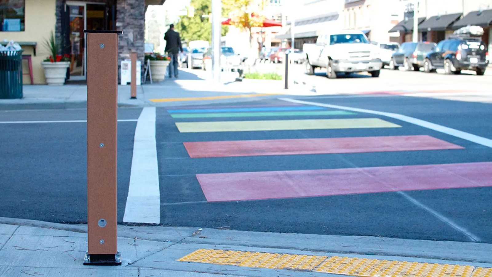 Modena Braille Bollard provides tactile wayfinding information for pedestrians. This bollard is made with recycled plastic lumber and powder-coated metal.